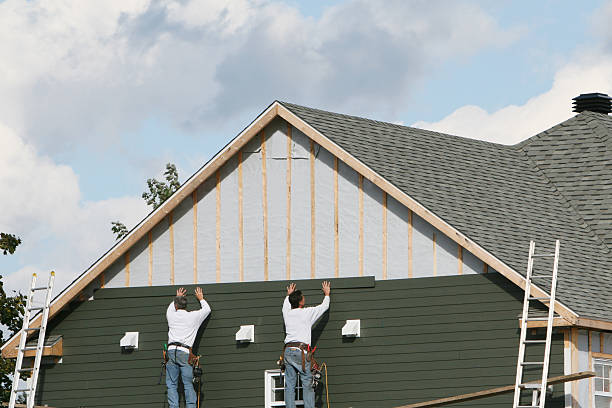 Professional Siding Repair technician working in Slickville, PA